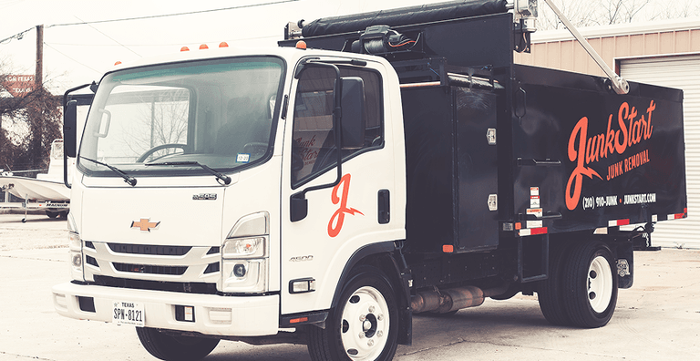 JunkStart junk removal team, truck, and crew at work