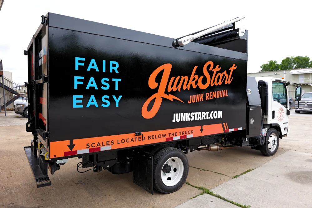 Black JunkStart junk removal truck with "FAIR FAST EASY" and "JUNK